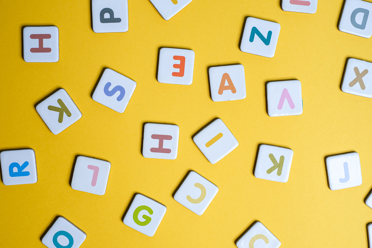 Alphabet Blocks on Yellow Background