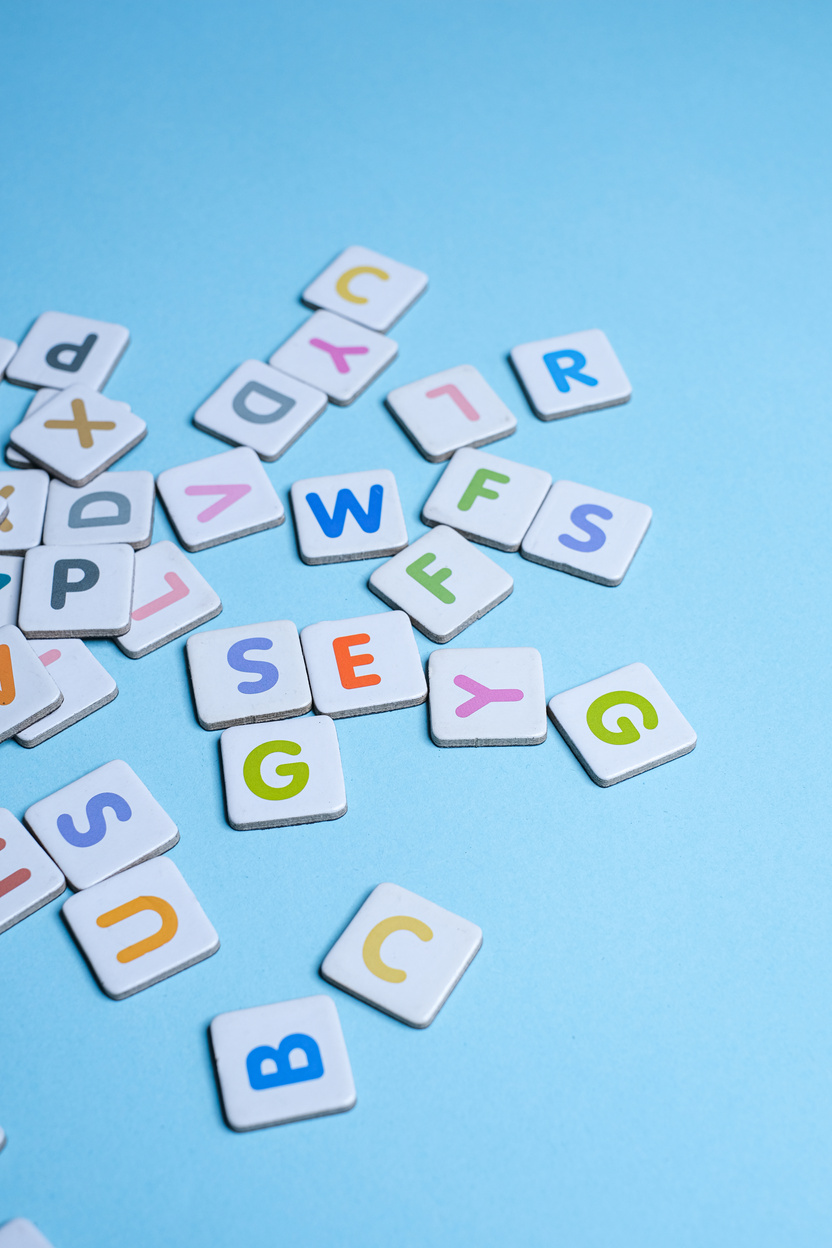 Alphabet Blocks on Blue Background